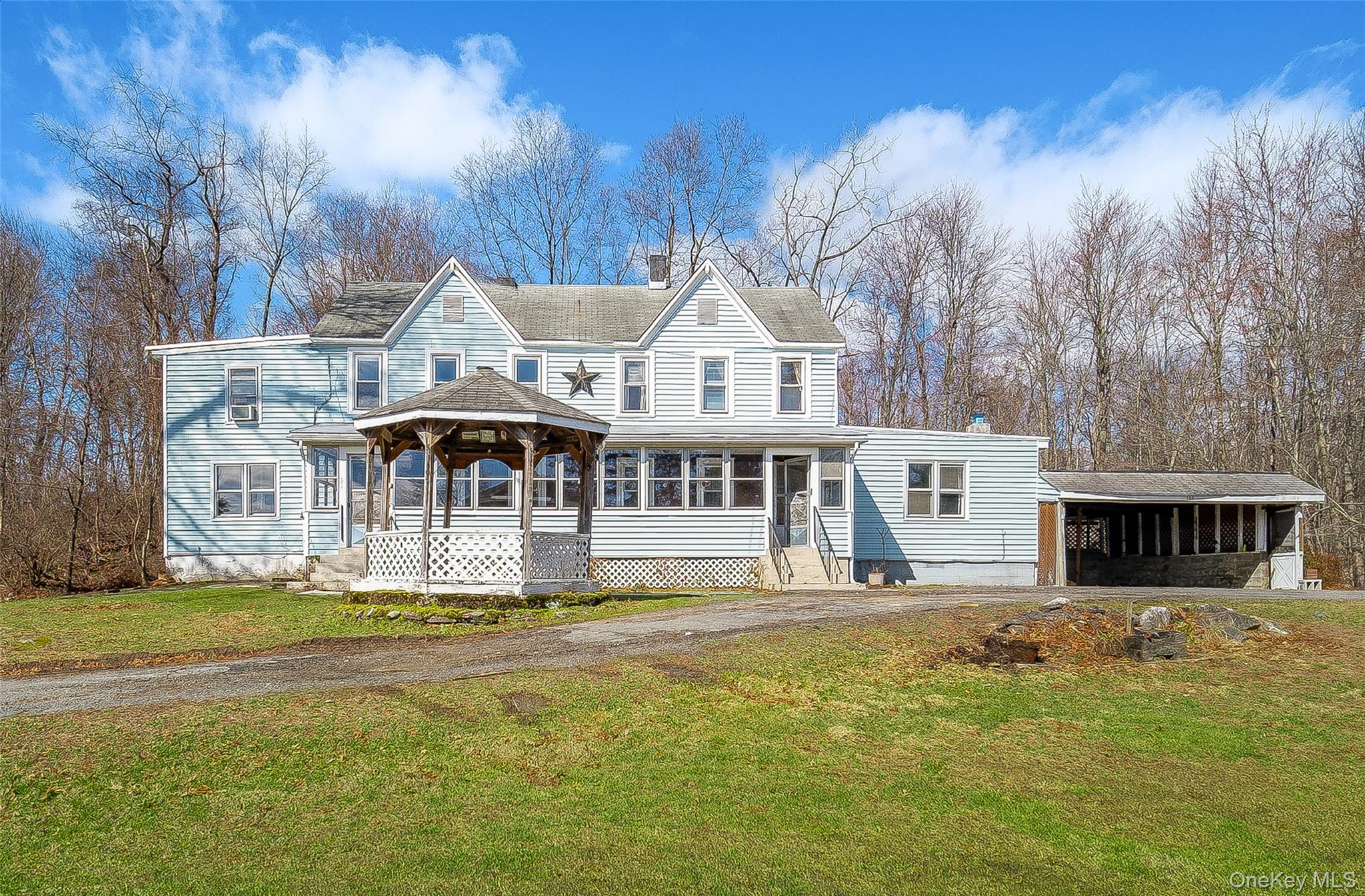 166 Brookside Farms Road Newburgh, NY 12550 - Photo 3 of 45 a front view of a house with a yard fountain and large tree