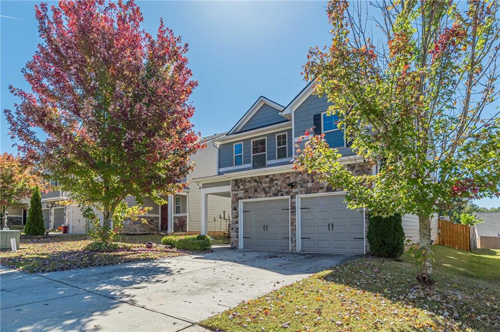 5027 Jack Drive Decatur, GA 30035 - Photo 1 of 1 a front view of a house with a garden