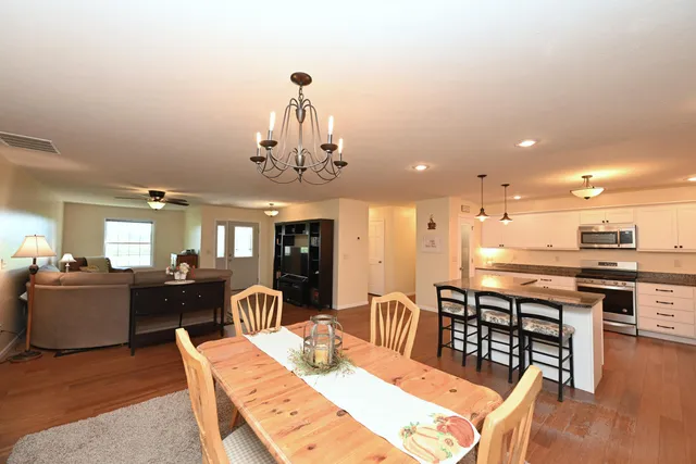 a view of a dining room with furniture