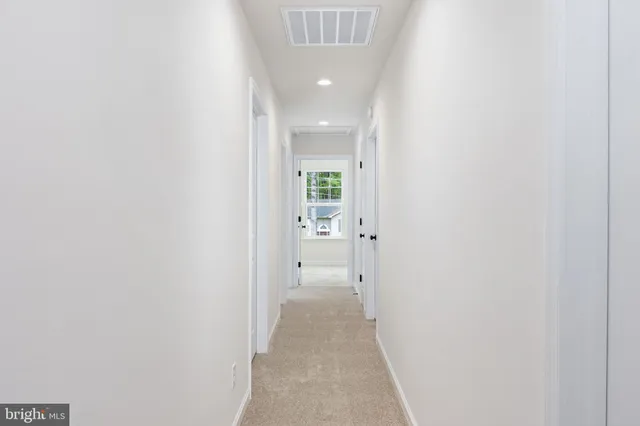 a view of room window and wooden floor