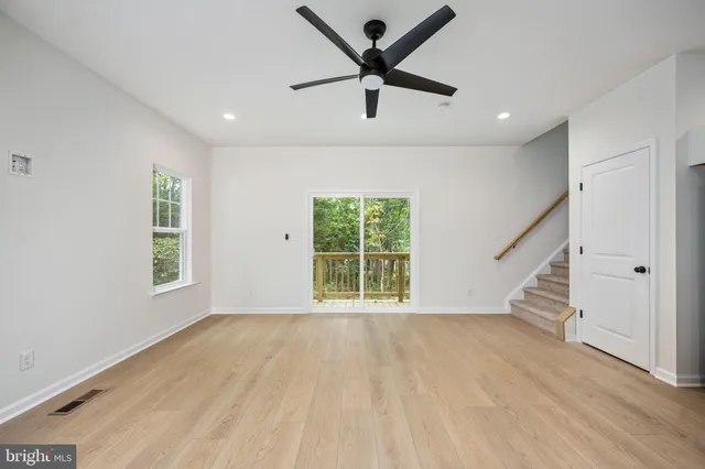 a view of an house with backyard space and garden