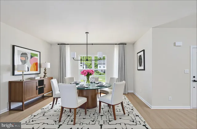 a view of a balcony with wooden floor and fence