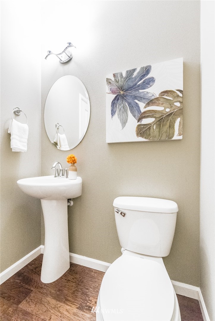 17809 46th Drive Southeast Bothell, WA 98012 - Photo 15 of 35 a bathroom with a toilet sink and mirror