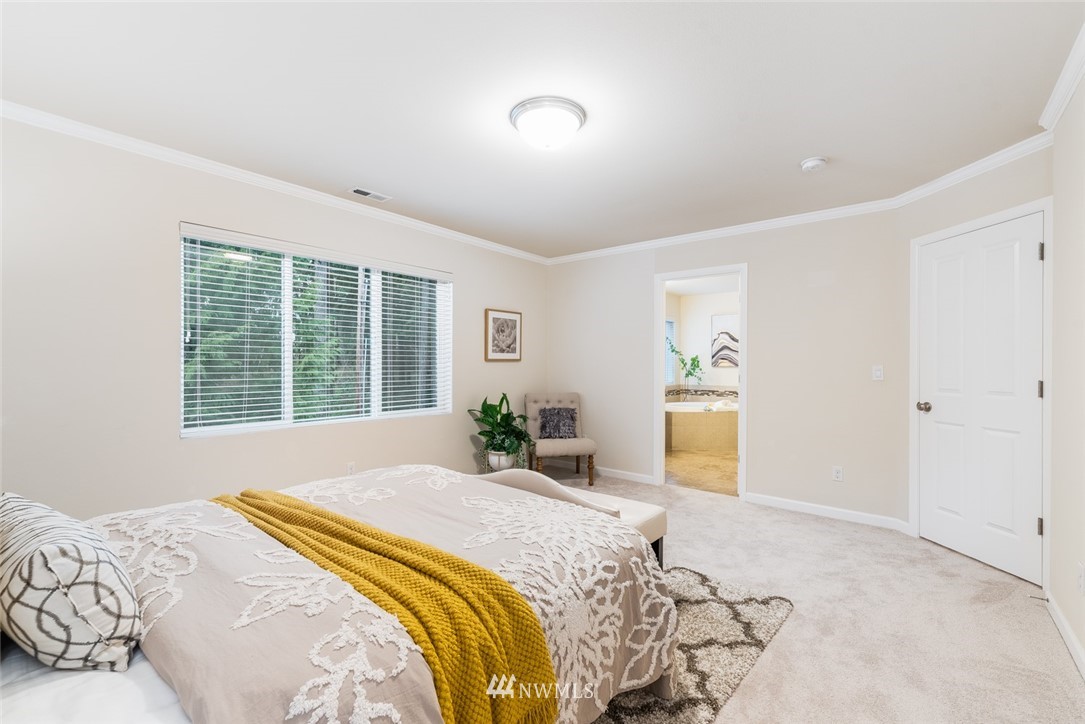 17809 46th Drive Southeast Bothell, WA 98012 - Photo 19 of 35 a bedroom with a bed and a window