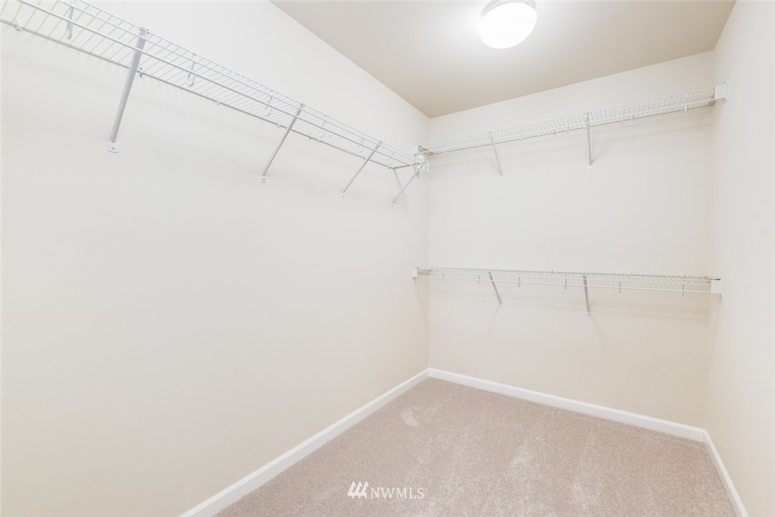 17809 46th Drive Southeast Bothell, WA 98012 - Photo 22 of 35 a view of a room with racks on the wall