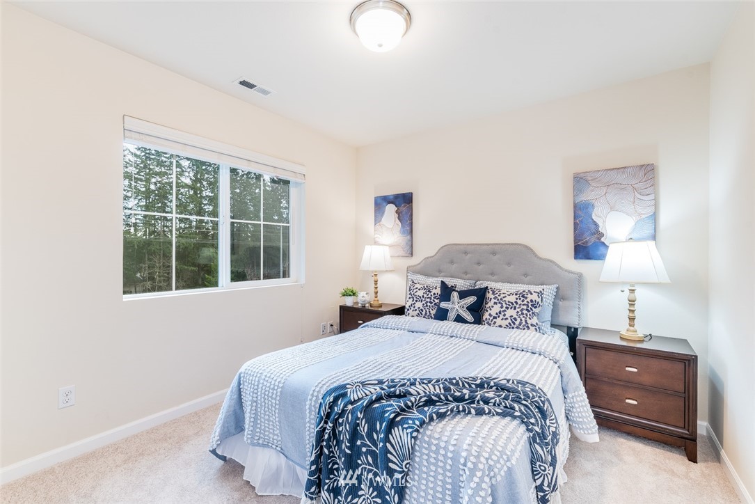 17809 46th Drive Southeast Bothell, WA 98012 - Photo 25 of 35 a bedroom with a bed and a window
