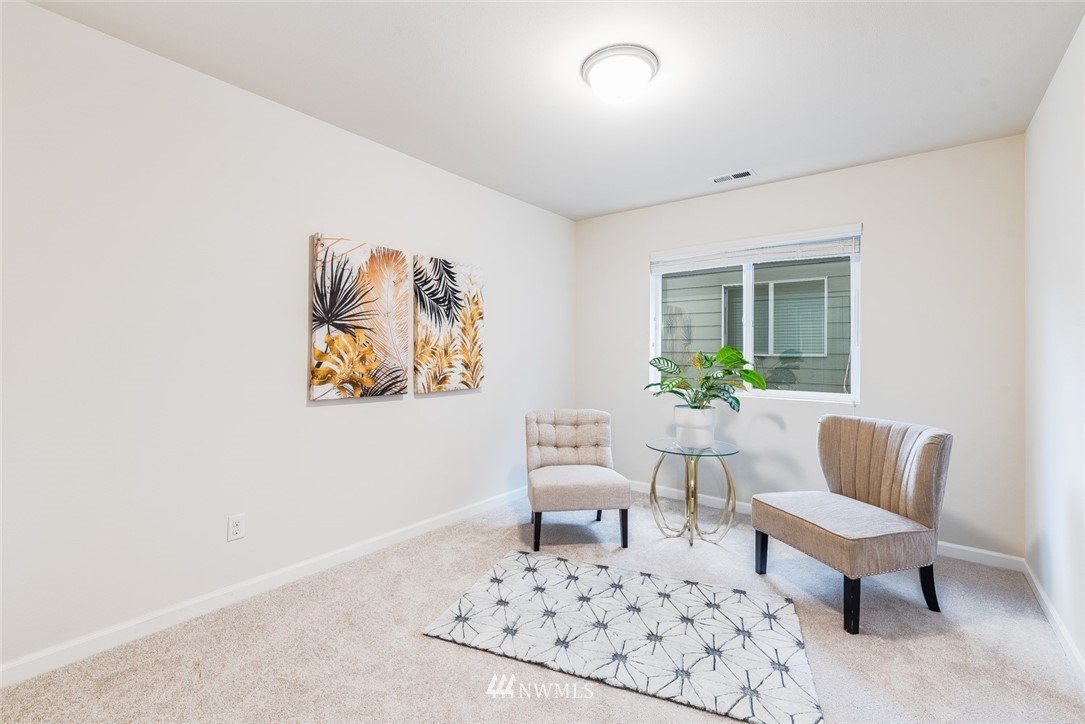 17809 46th Drive Southeast Bothell, WA 98012 - Photo 26 of 35 a living room with furniture and a potted plant