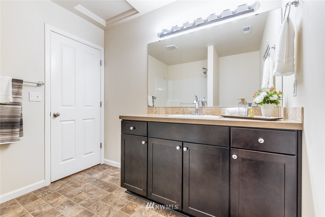 17809 46th Drive Southeast Bothell, WA 98012 - Photo 28 of 35 a bathroom with a sink and a mirror