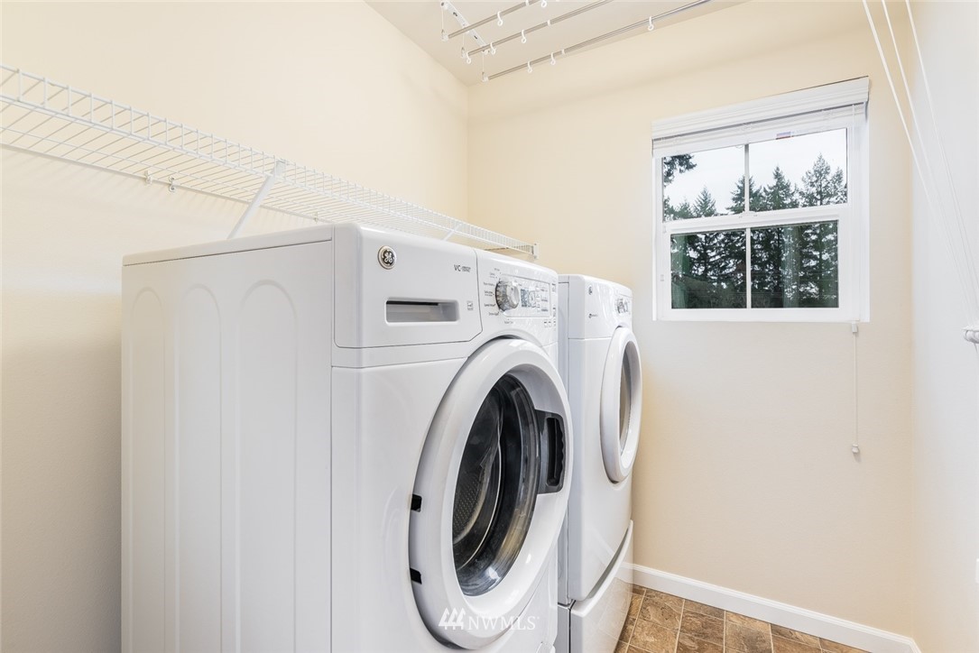 17809 46th Drive Southeast Bothell, WA 98012 - Photo 29 of 35 a utility room with dryer and washer