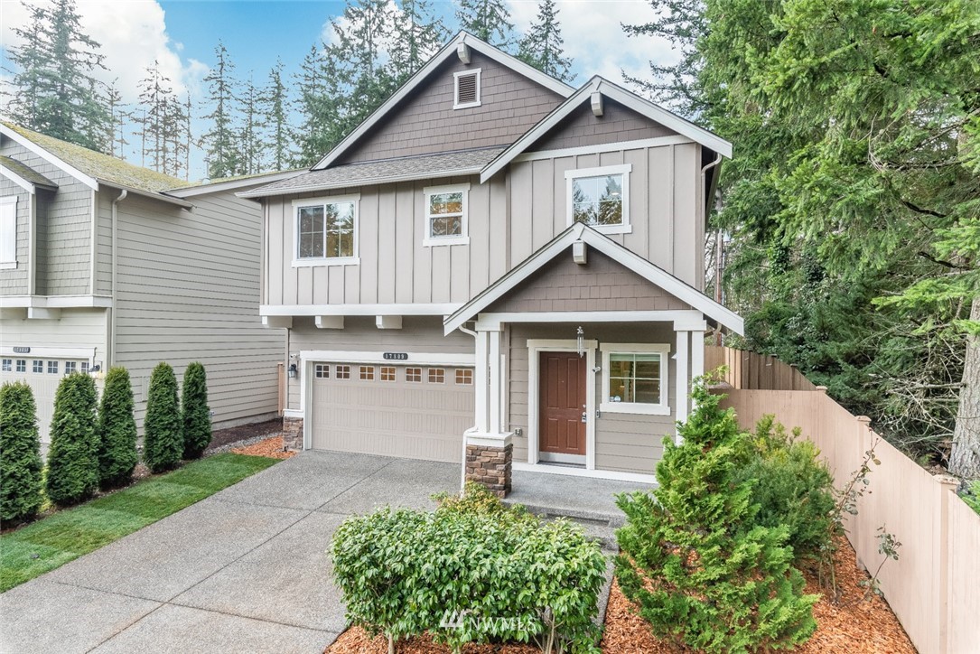 17809 46th Drive Southeast Bothell, WA 98012 - Photo 3 of 35 a front view of a house with garden