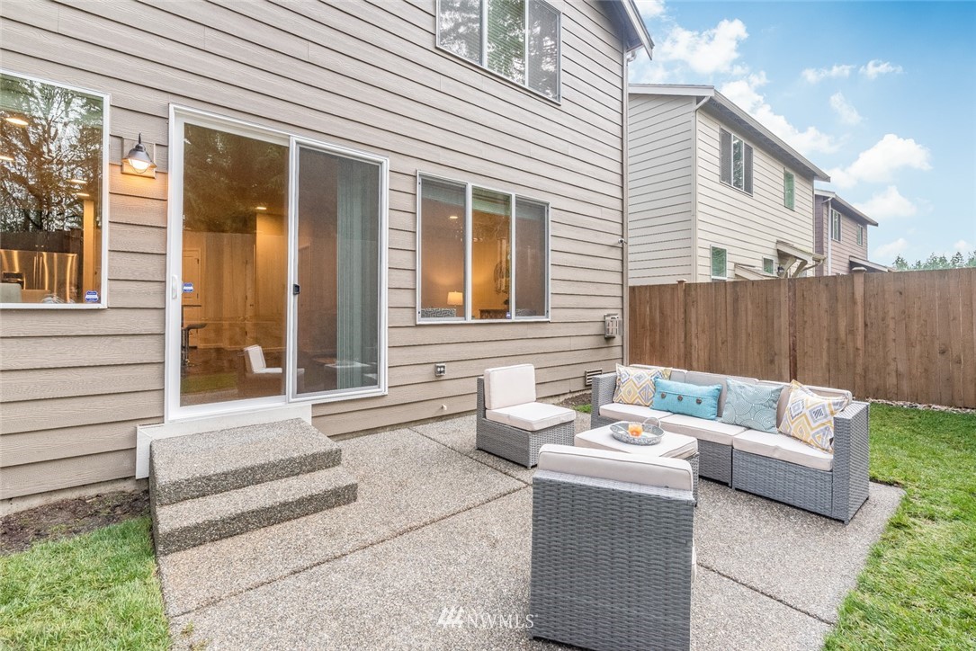 17809 46th Drive Southeast Bothell, WA 98012 - Photo 32 of 35 a view of a house with couches and a patio
