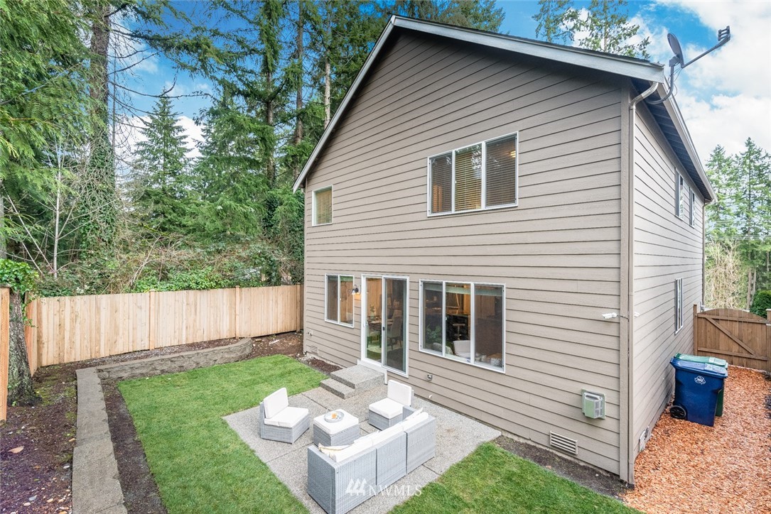 17809 46th Drive Southeast Bothell, WA 98012 - Photo 4 of 35 a white house that has tree in front of it