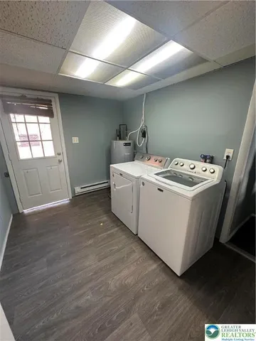 a utility room with washer and dryer