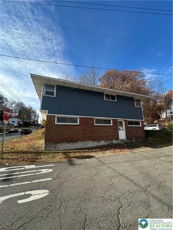 a view of house with outdoor space