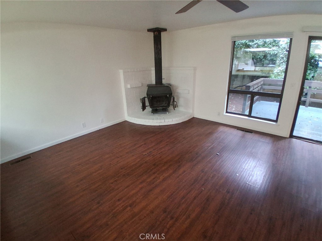 6402 Corning Court Magalia, CA 95954 - Photo 2 of 15 a view of a hallway with wooden floor and a window
