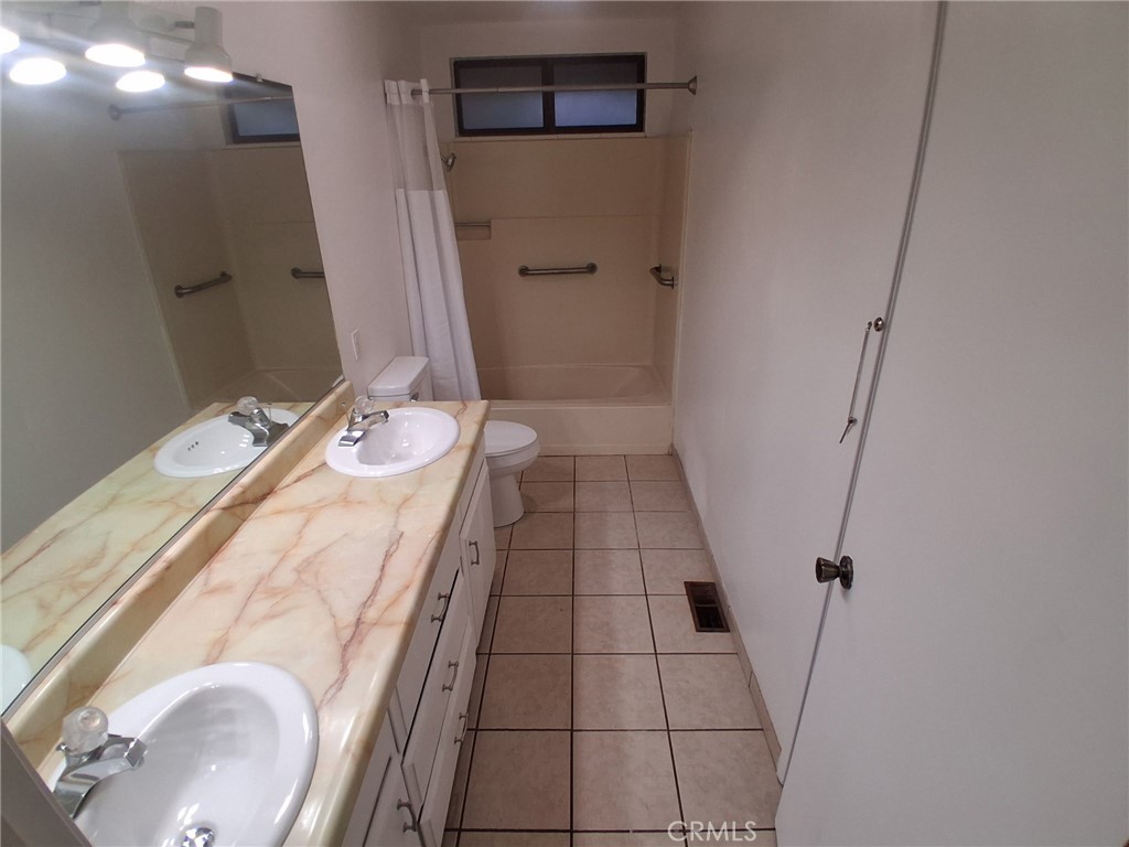 6402 Corning Court Magalia, CA 95954 - Photo 7 of 15 a bathroom with a sink and mirror