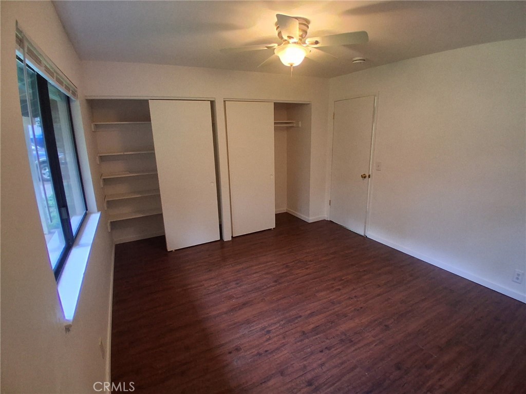 6402 Corning Court Magalia, CA 95954 - Photo 10 of 15 wooden floor in an empty room with a window