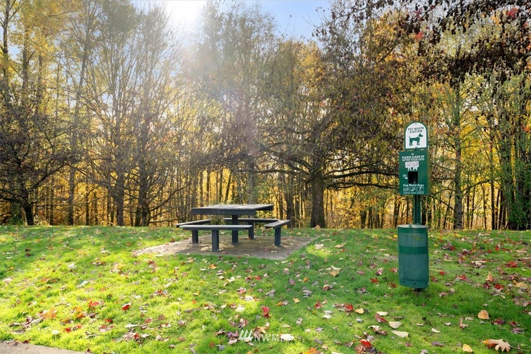 18346 Rainier View Road Southeast Monroe, WA 98272 - Photo 35 of 40 a view of a bench in a garden