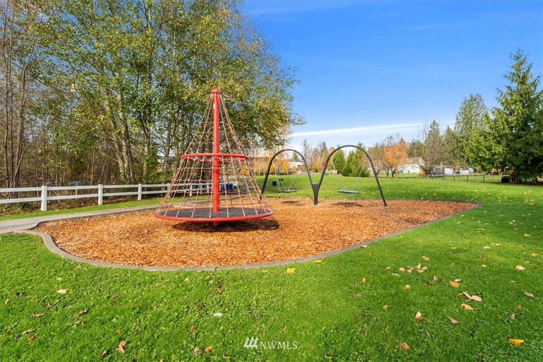 18346 Rainier View Road Southeast Monroe, WA 98272 - Photo 37 of 40 a view of a park with swings
