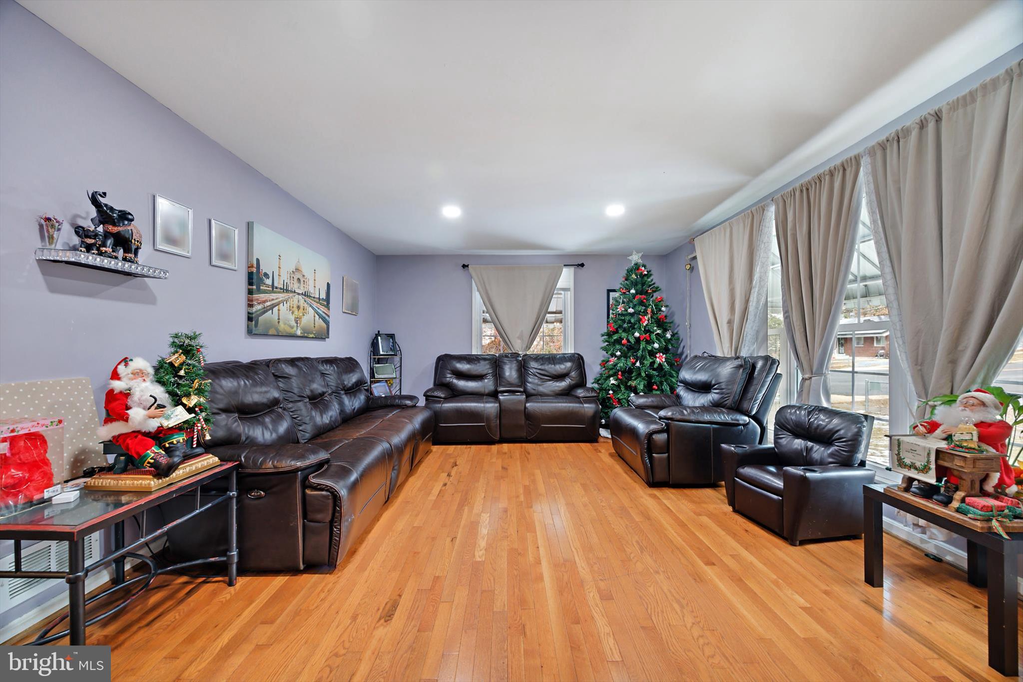 5401 Kenmont Road Oxon Hill, MD 20745 - Photo 11 of 39 a living room with furniture fireplace and flat screen tv