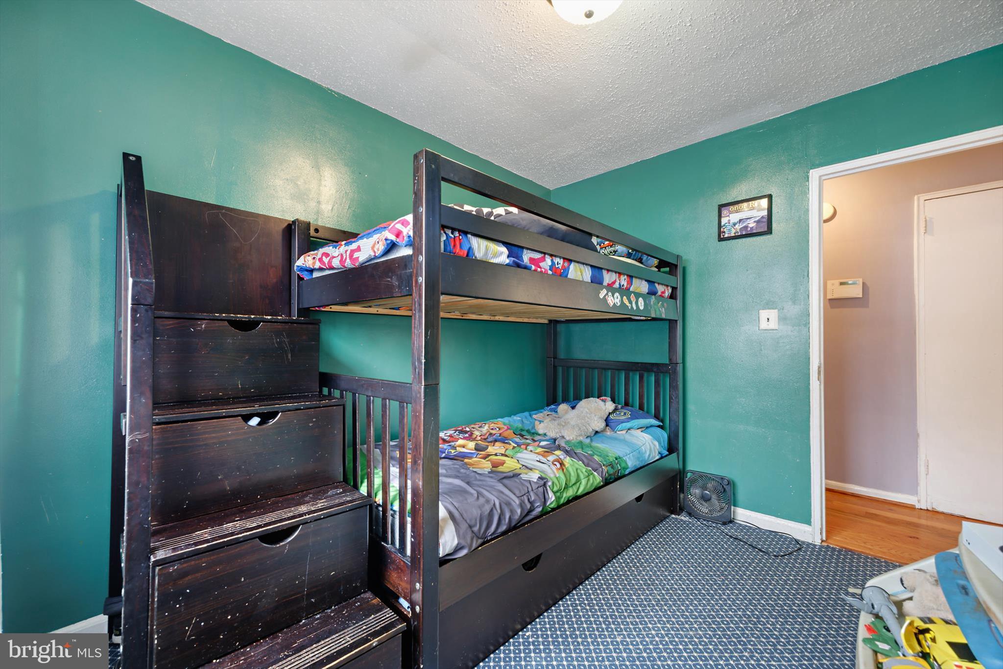 5401 Kenmont Road Oxon Hill, MD 20745 - Photo 22 of 39 a bedroom with bunk bed and a window