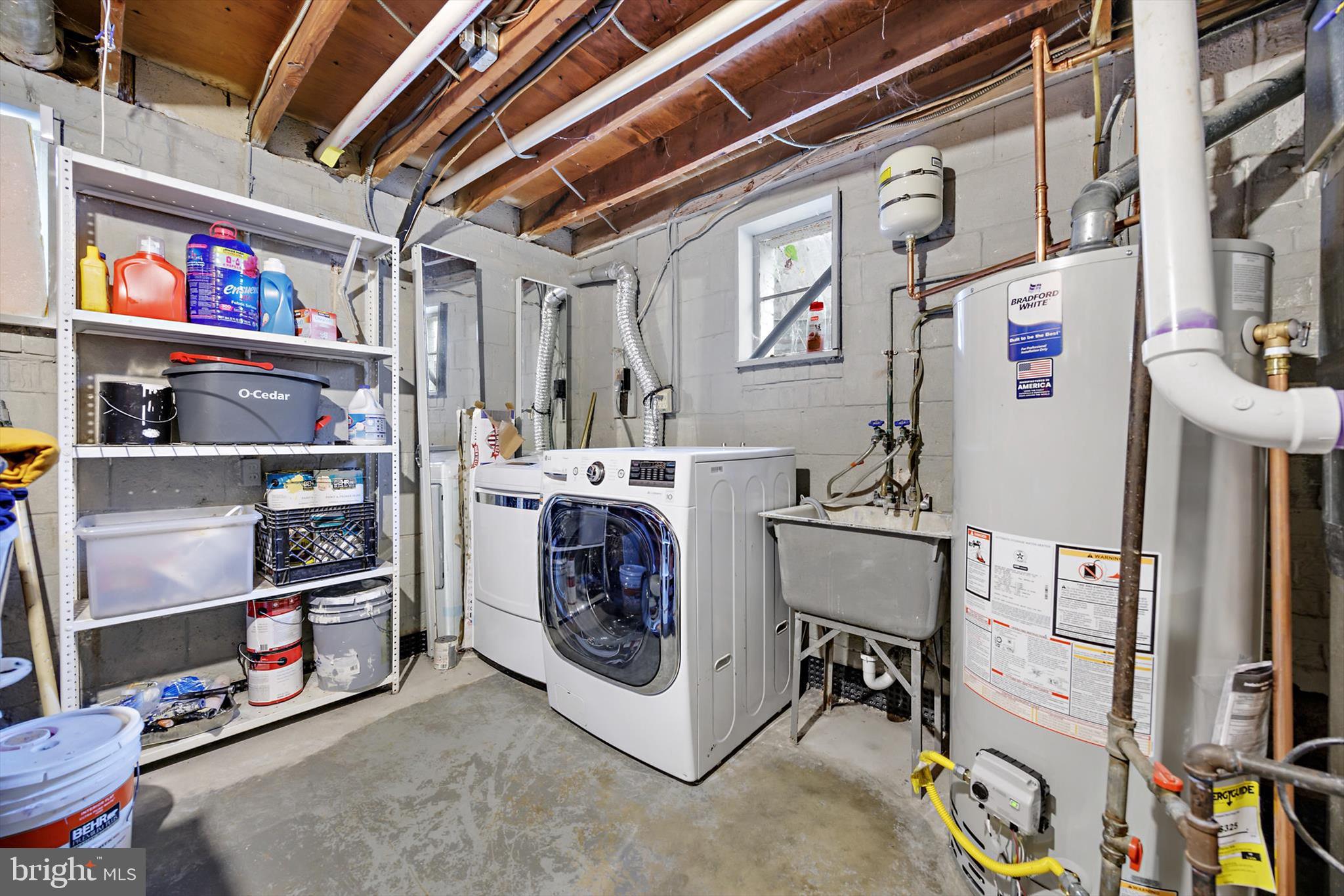 5401 Kenmont Road Oxon Hill, MD 20745 - Photo 34 of 39 a view of walk in closet with clothes and shoes
