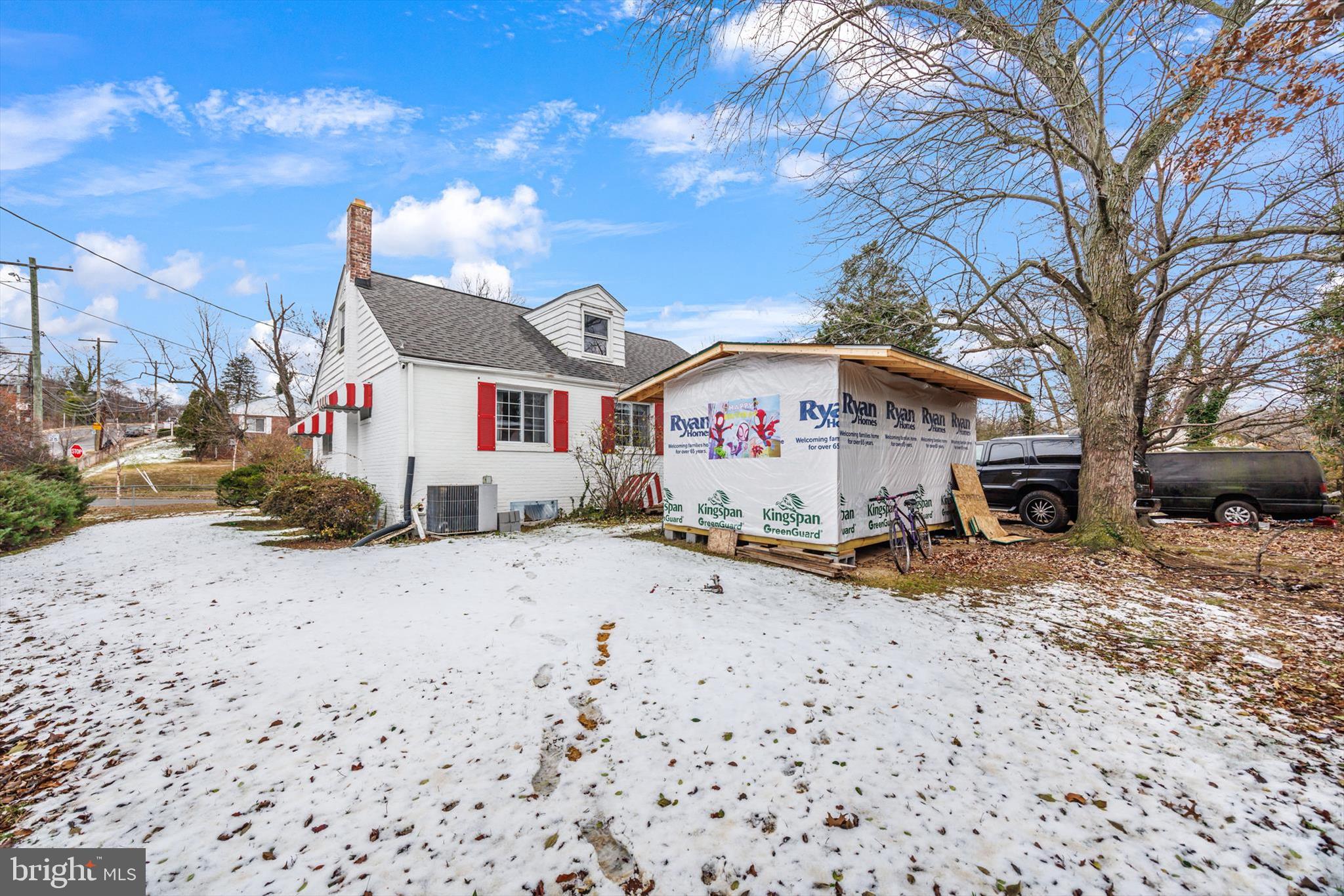 5401 Kenmont Road Oxon Hill, MD 20745 - Photo 35 of 39 a front view of a house with a dirt yard