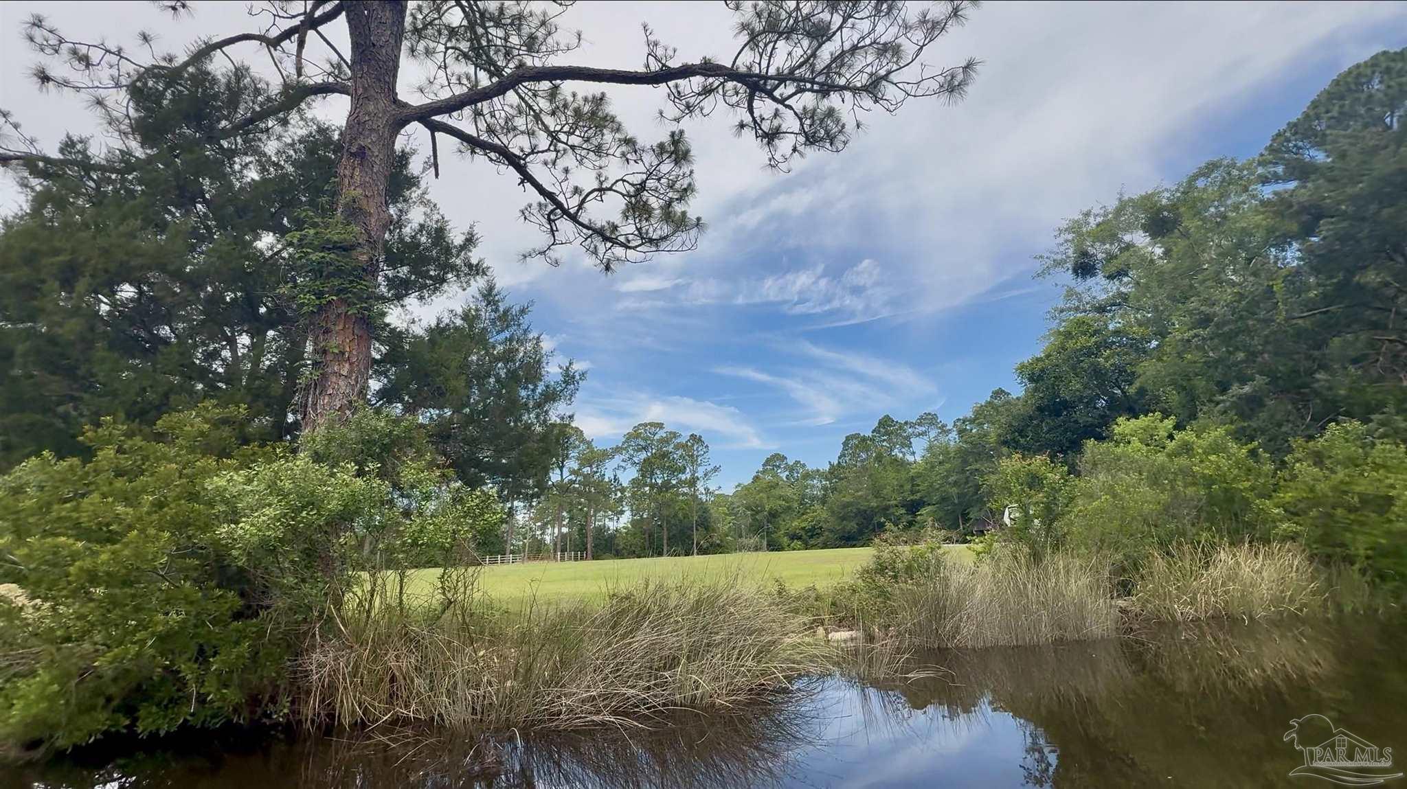 7524 Petersen Point Road Milton, FL 32583 - Photo 10 of 26 a view of lake with green space
