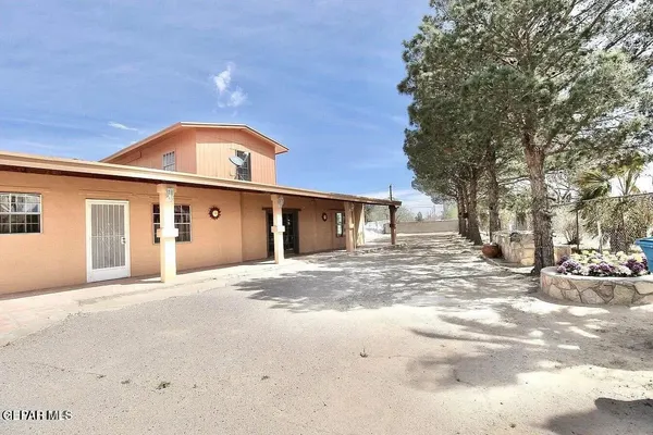 a front view of a house with a garage