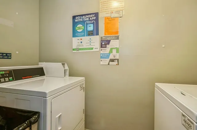a view of balcony with wooden floor and fence