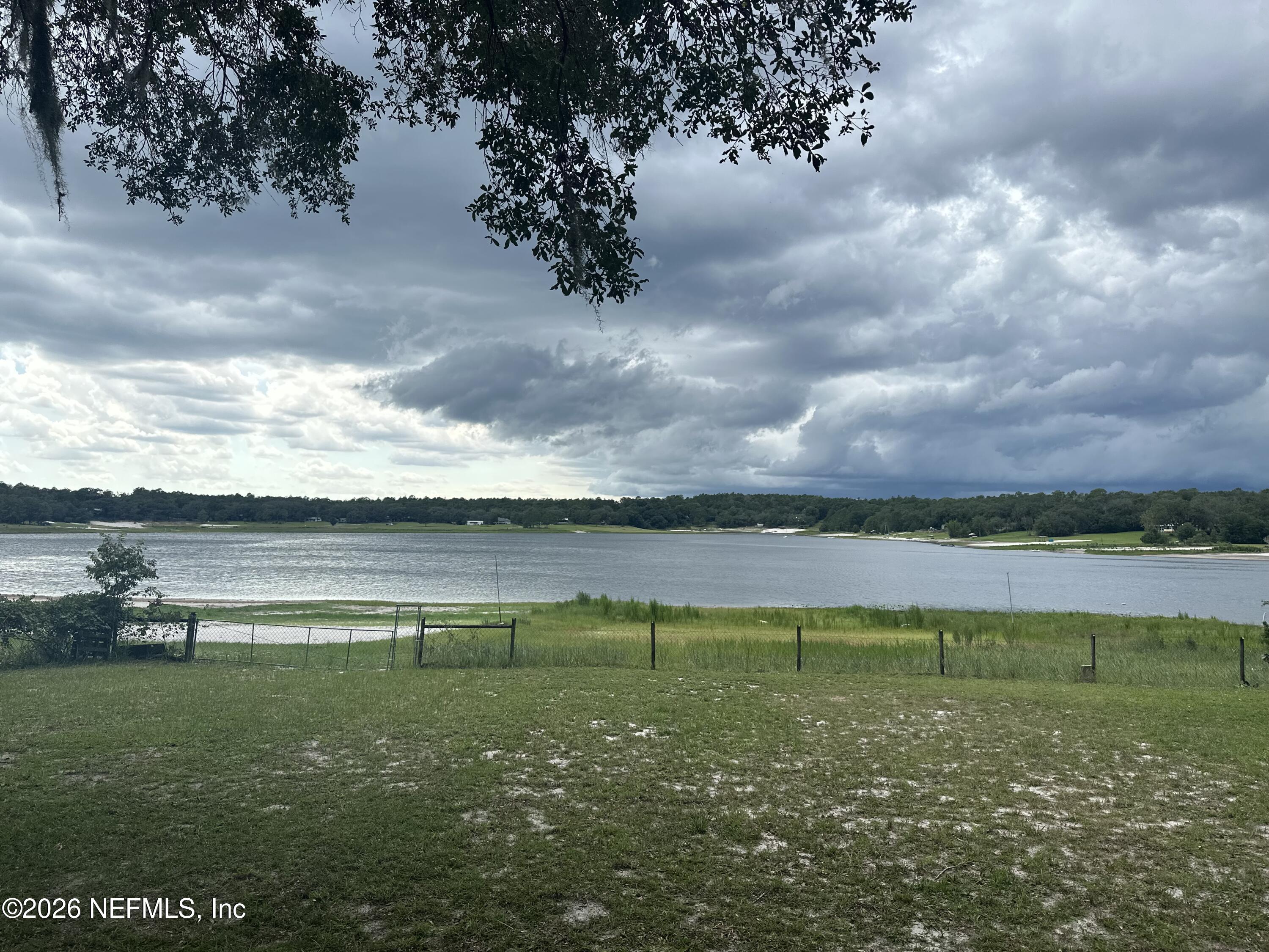 6848 Spring Lake Road Keystone Heights, FL 32656 - Photo 1 of 10 lake near shore