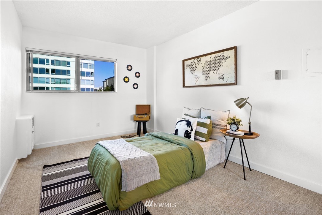 507 West Mercer Street, Unit 603 Seattle, WA 98119 - Photo 14 of 21 a bedroom with double bed and a window