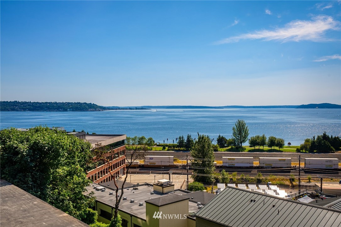 507 West Mercer Street, Unit 603 Seattle, WA 98119 - Photo 2 of 21 a view of a city with an ocean view