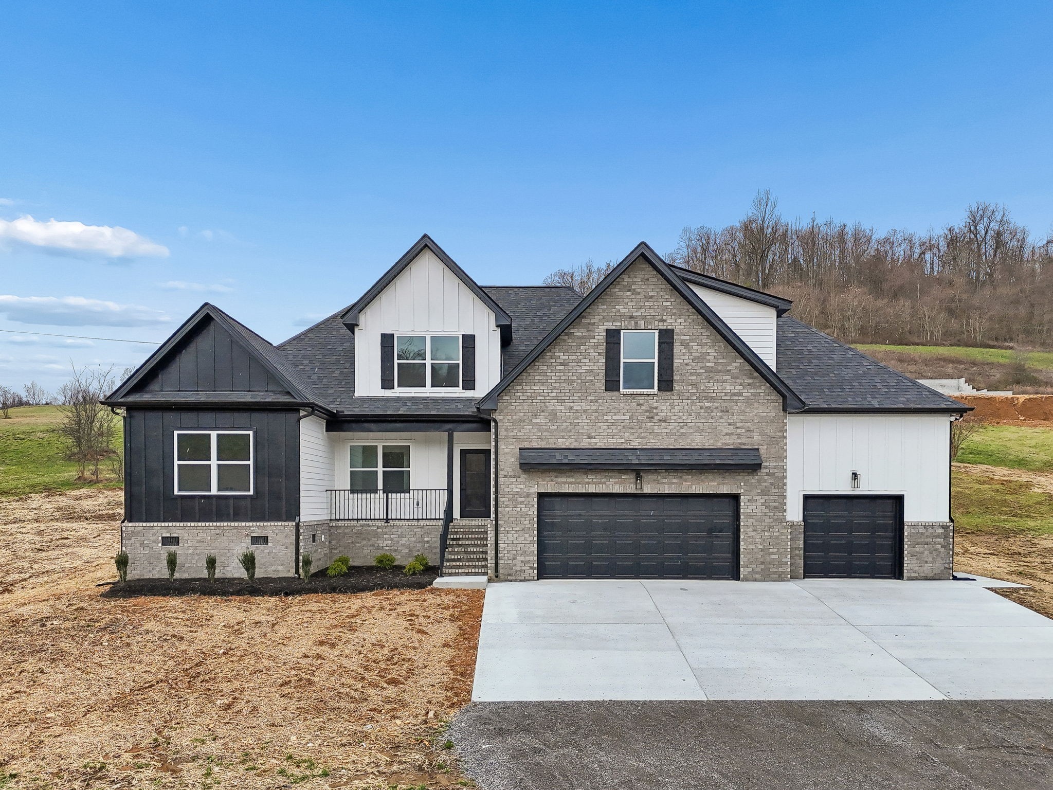 1501 Opossum Paw Road Beechgrove, TN 37018 - Photo 3 of 55 a front view of a house with yard
