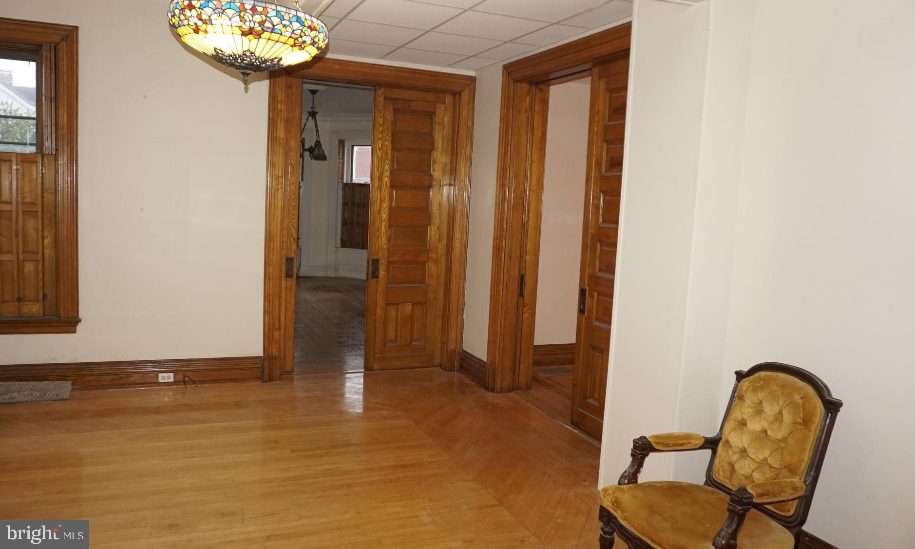 200 East Walnut Street, Unit 1 Hanover, PA 17331 - Photo 14 of 29 a view of a hallway with entryway wooden floor and front door