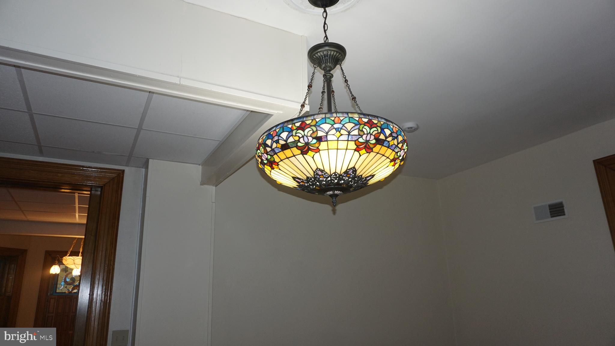 200 East Walnut Street, Unit 1 Hanover, PA 17331 - Photo 16 of 29 a room with water heater and wooden cabinets