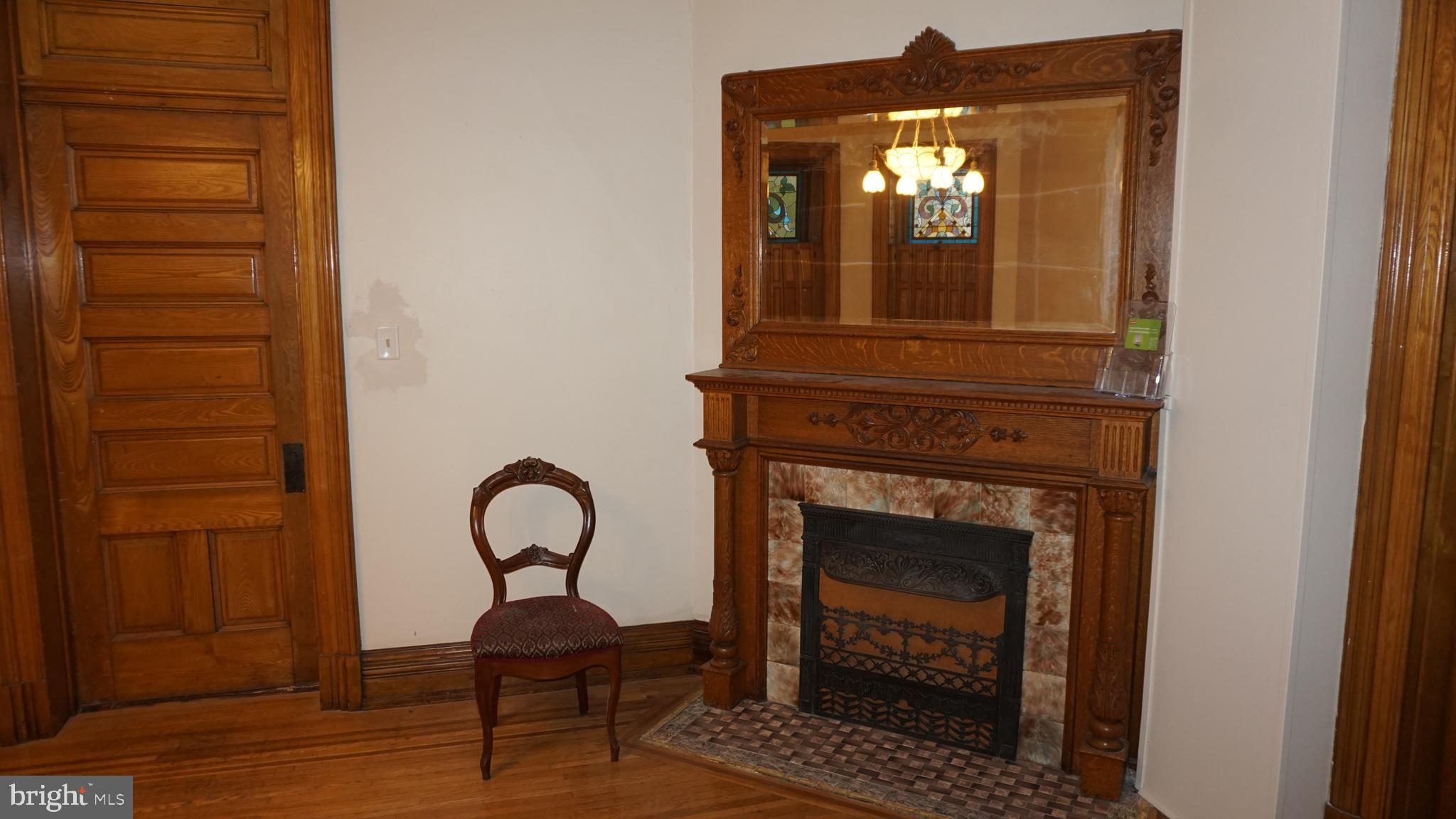 200 East Walnut Street, Unit 1 Hanover, PA 17331 - Photo 22 of 29 a view of a livingroom with furniture and a mirror