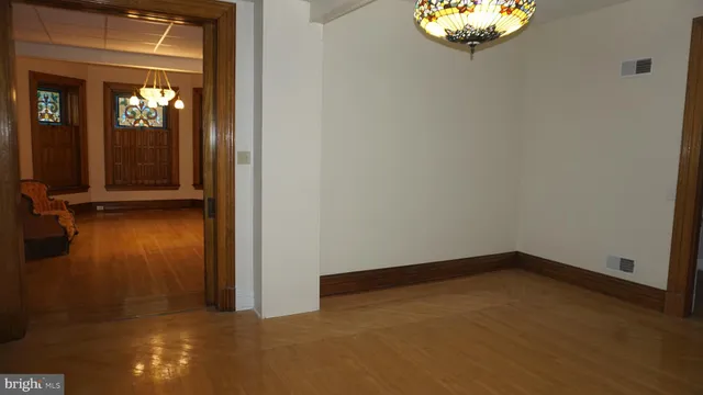 a bedroom with a bed and a table