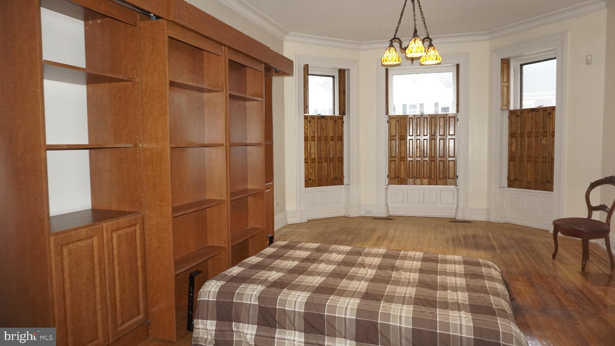 200 East Walnut Street, Unit 1 Hanover, PA 17331 - Photo 27 of 29 a bedroom with a bed and a window