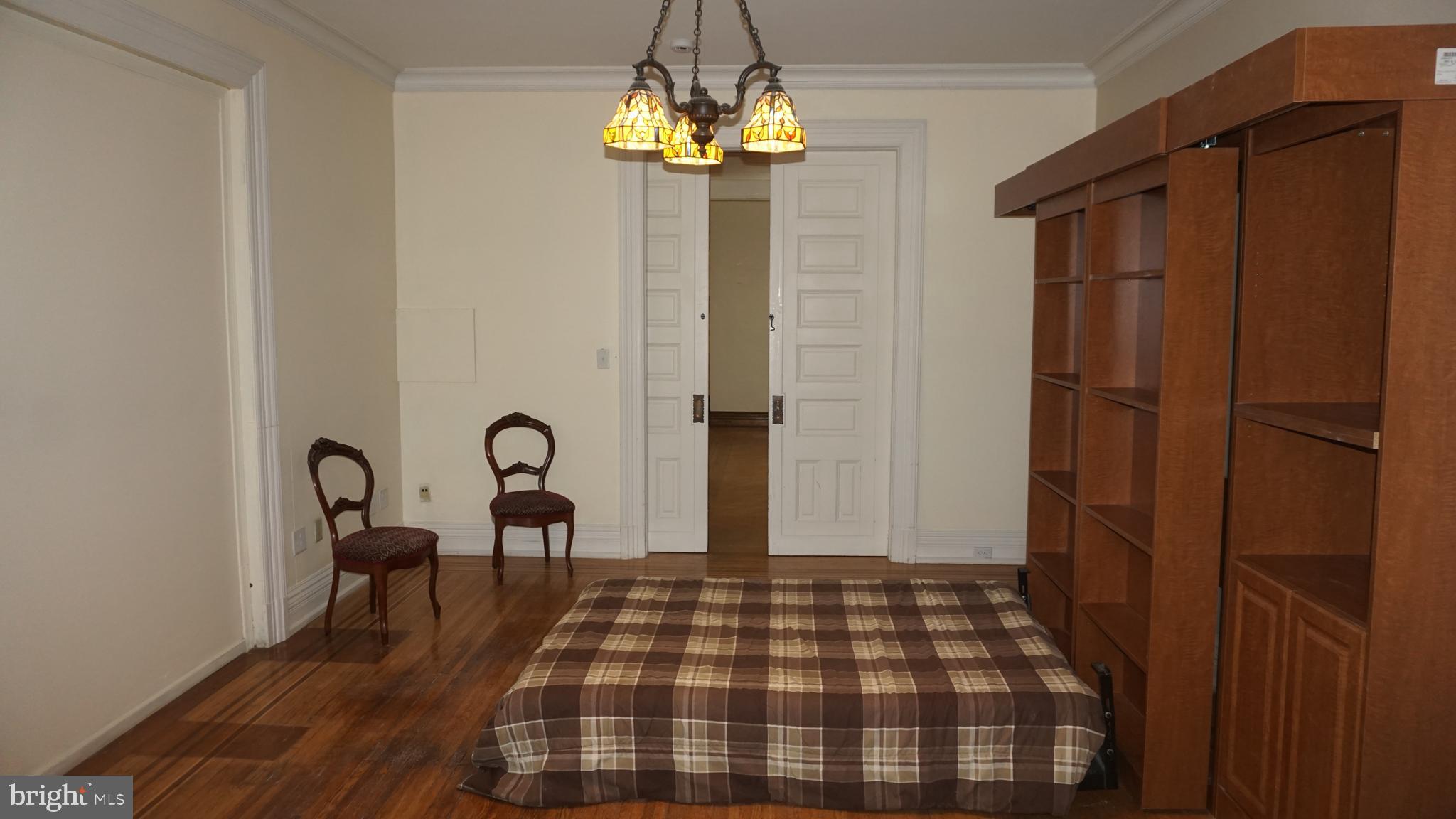 200 East Walnut Street, Unit 1 Hanover, PA 17331 - Photo 29 of 29 a bedroom with a bed and a table