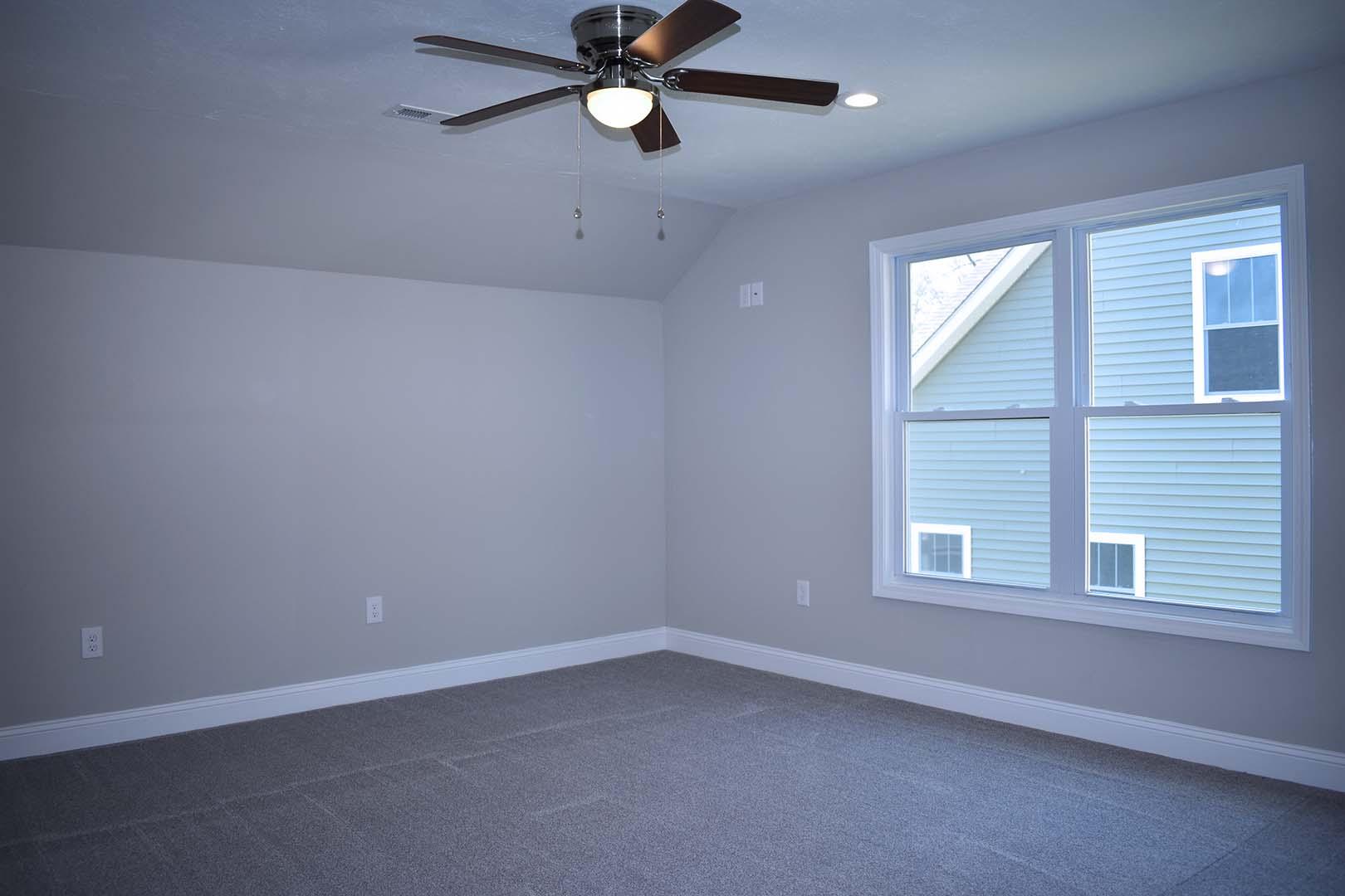 4257 Daugherty Road Salem, VA 24153 - Photo 33 of 37 an empty room with a window and a fan
