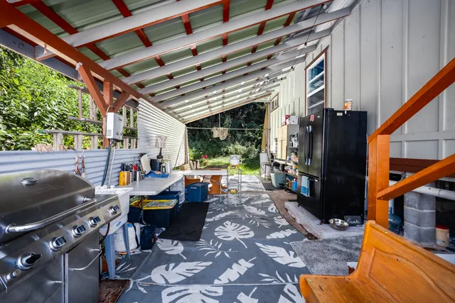 a view of a porch with furniture