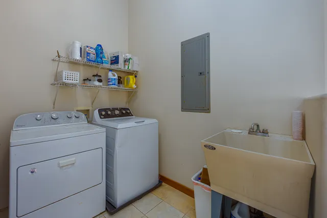 a utility room with dryer and washer