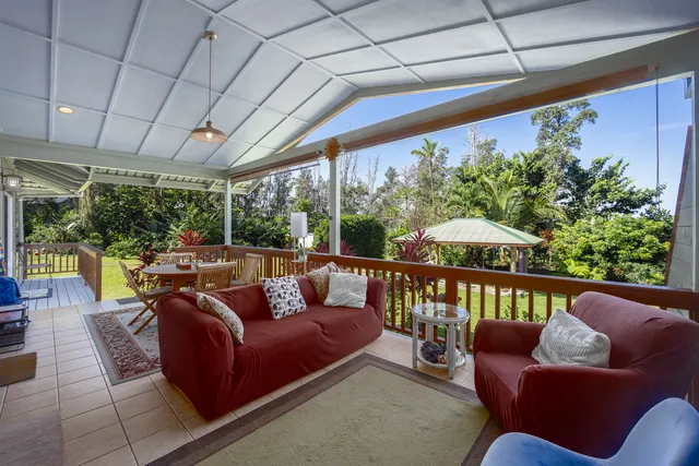 a outdoor living space with furniture and garden view