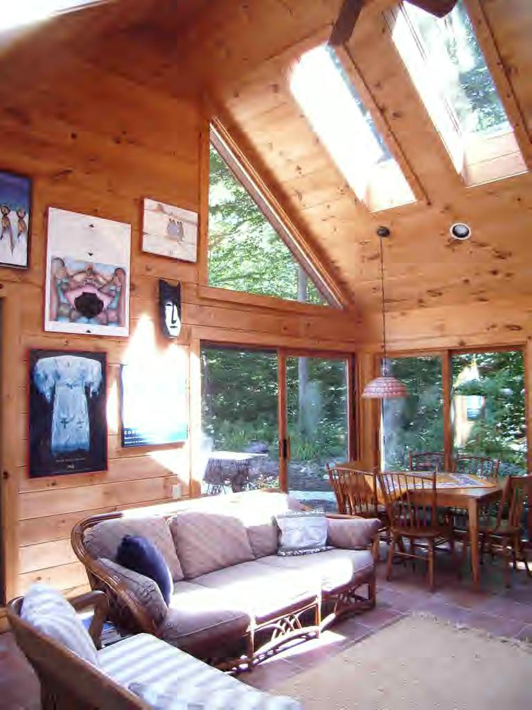 196 Woodmere Road Becket, MA 01223 - Photo 5 of 6 a living room with furniture and a large window