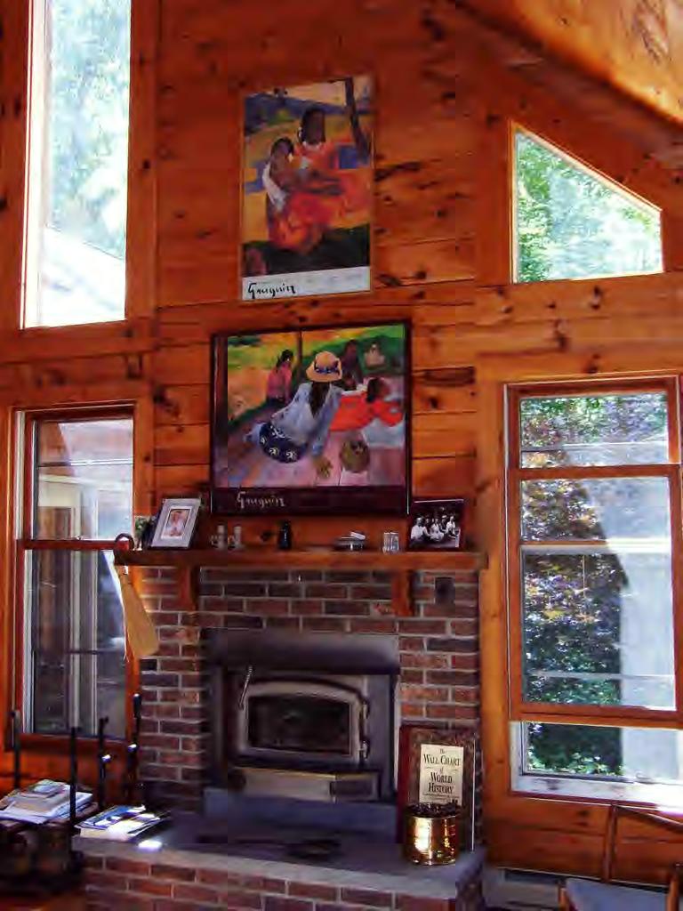 196 Woodmere Road Becket, MA 01223 - Photo 6 of 6 a view of a fireplace with a wooden floor