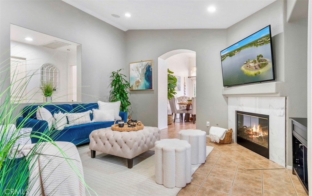 16366 West Sun Canyon Street Riverside, CA 92503 - Photo 3 of 21 a living room with furniture and a fireplace