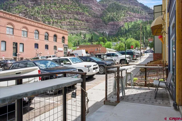 a view of a building with sitting area