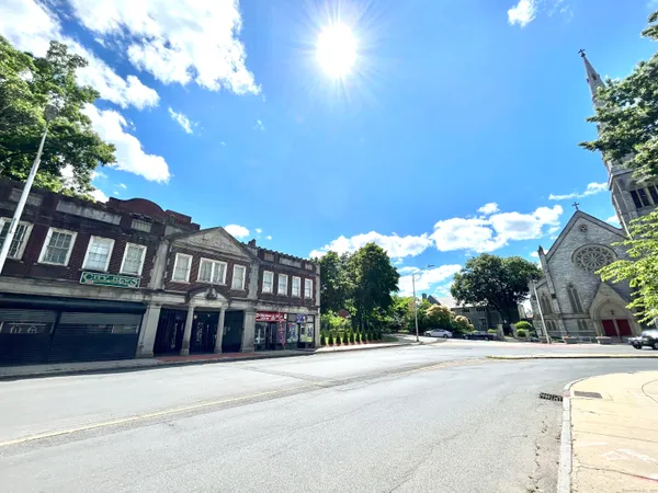 a view of a building with a street
