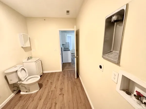 a bathroom with a sink and toilet